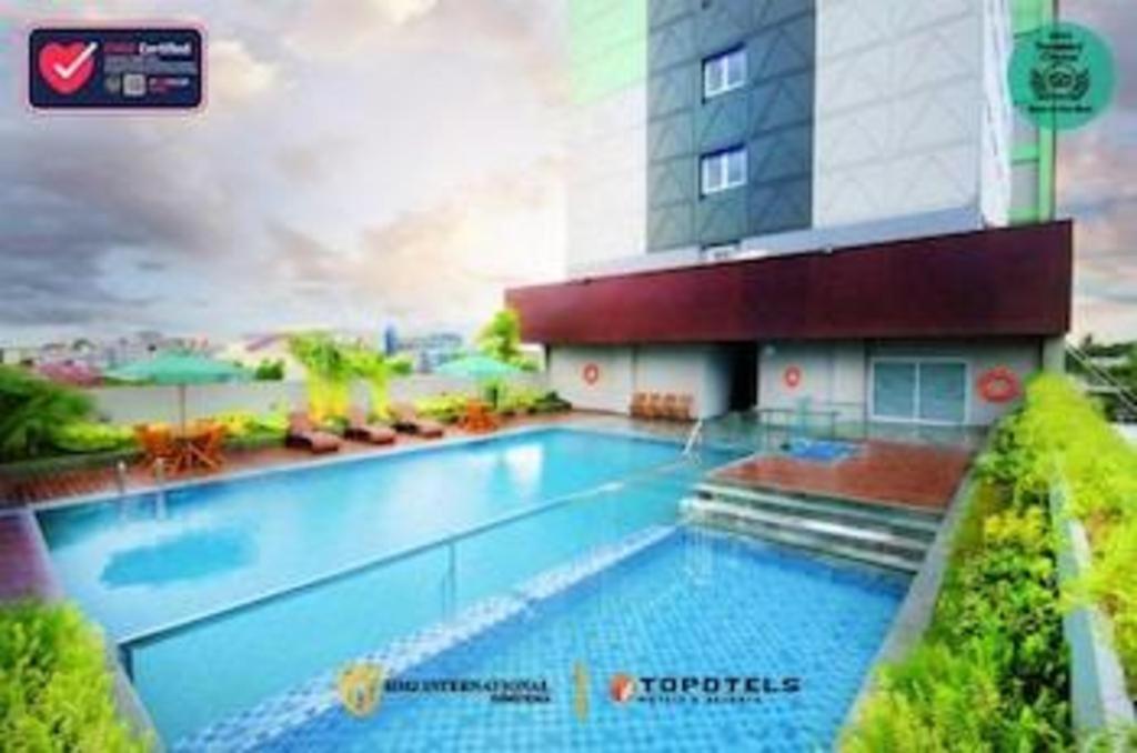 Ayola First Point Hotel Пеканбару Екстериор снимка